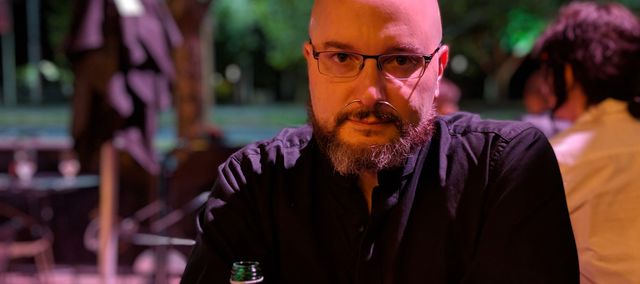 Jeremy Bornstein at a table outside